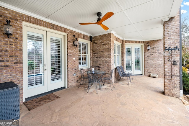 view of patio / terrace with french doors and ceiling fan