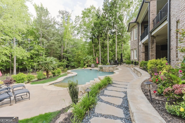 8760 Colonial Pl, Duluth, GA 30097 - view of pool featuring a patio and a pool with connected hot tub