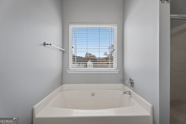 full bathroom featuring a garden tub