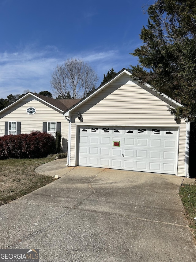 exterior space with a garage