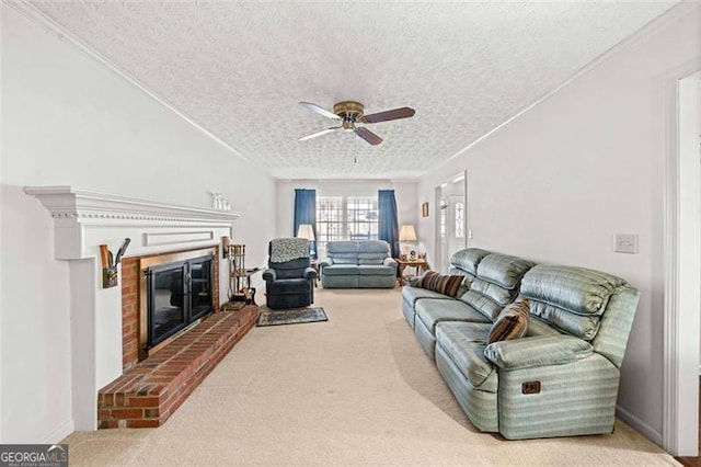 living area featuring a textured ceiling, carpet, and a fireplace