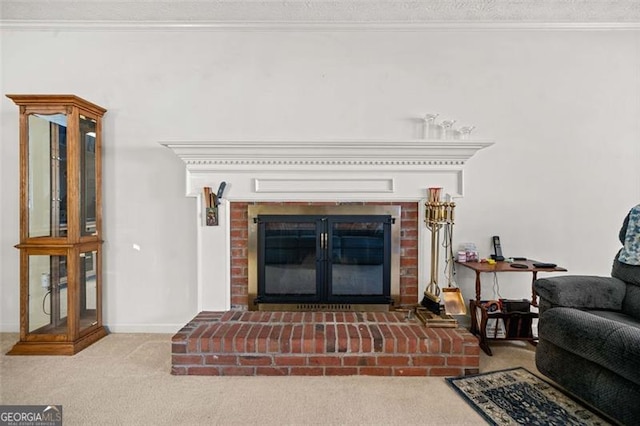 interior space featuring a fireplace, ornamental molding, carpet flooring, a textured ceiling, and baseboards