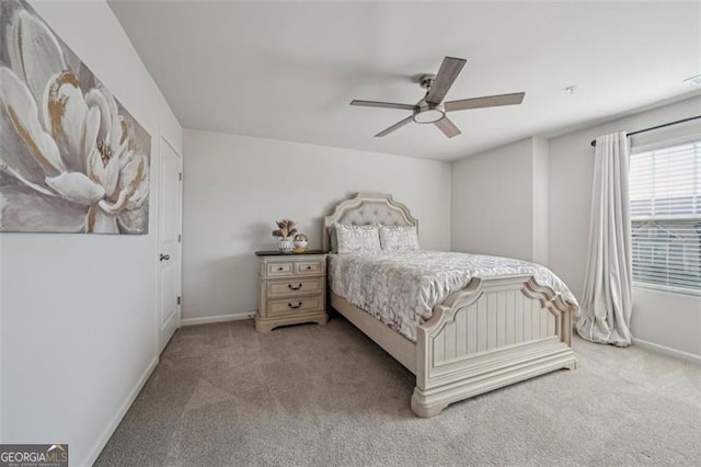 bedroom featuring carpet floors, ceiling fan, and baseboards