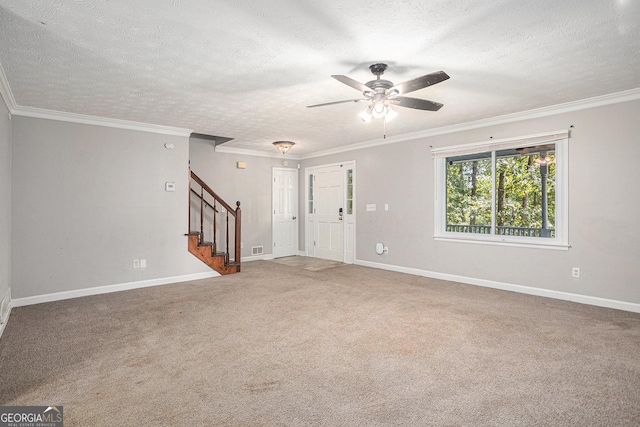 unfurnished living room featuring stairs, carpet floors, ornamental molding, and baseboards