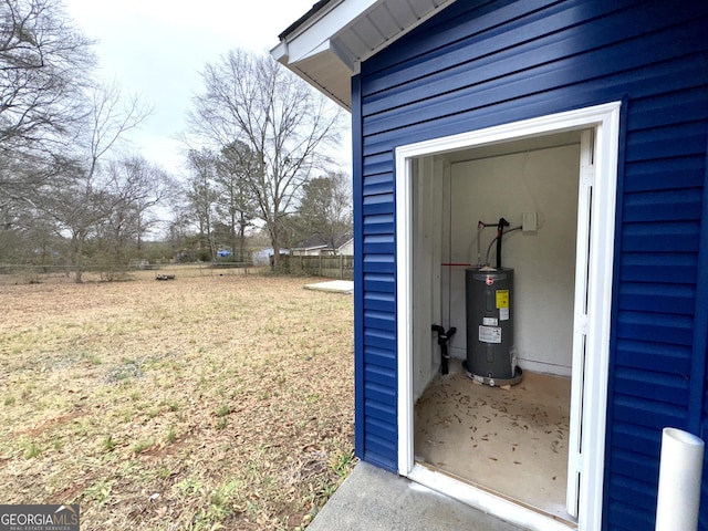 view of outbuilding featuring fence