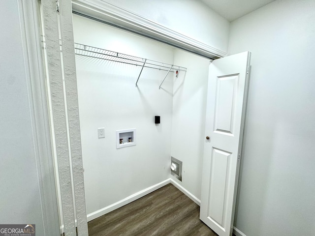 laundry area with hookup for a washing machine, laundry area, dark wood-type flooring, baseboards, and electric dryer hookup