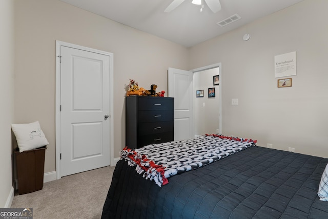 bedroom with light carpet, baseboards, visible vents, and a ceiling fan