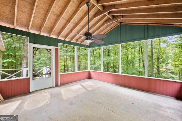 unfurnished sunroom featuring lofted ceiling and ceiling fan