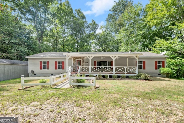 ranch-style home featuring a porch, crawl space, and a front yard