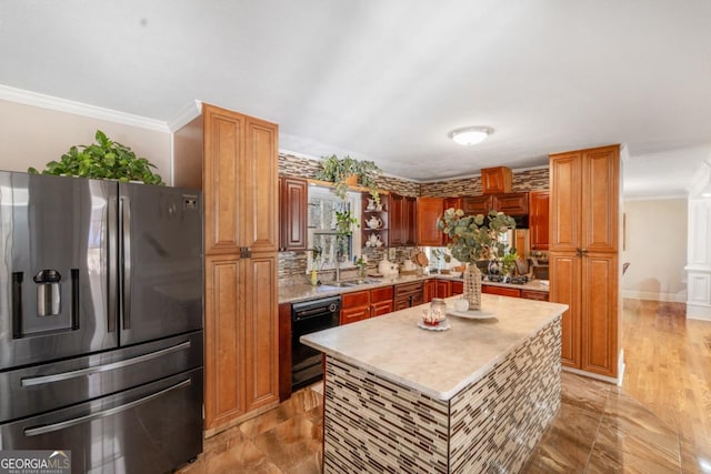 kitchen featuring ornamental molding, black dishwasher, light countertops, and stainless steel refrigerator with ice dispenser