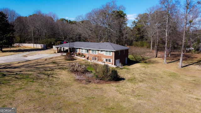 exterior space with a wooded view