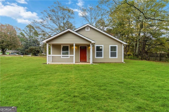 view of front of home featuring a porch and a front yard