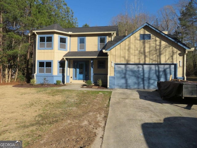 traditional-style house with brick siding, concrete driveway, board and batten siding, a garage, and a front lawn