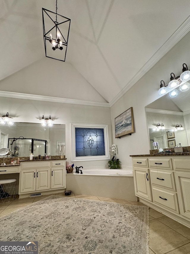 bathroom featuring a garden tub, tile patterned flooring, ornamental molding, and a shower stall