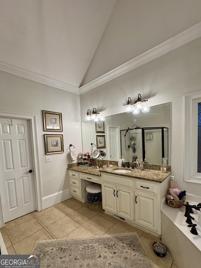 bathroom with lofted ceiling, a stall shower, tile patterned floors, and crown molding