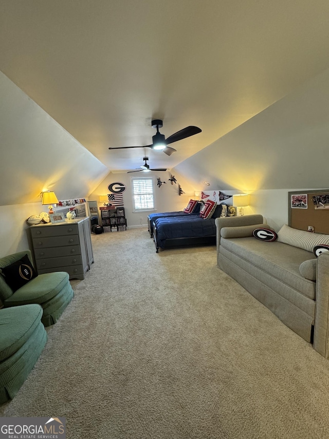 bedroom with carpet floors, vaulted ceiling, and ceiling fan