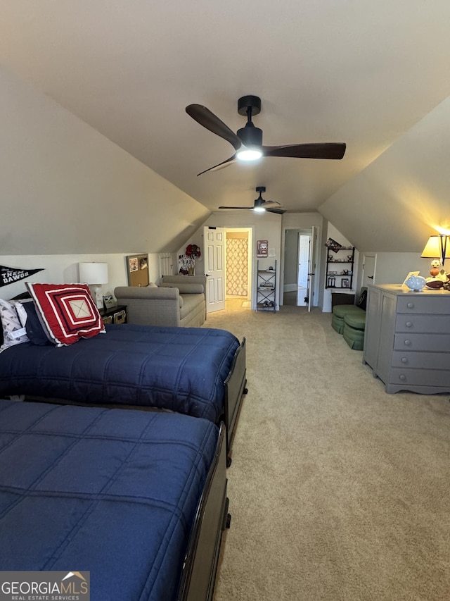 bedroom featuring lofted ceiling and light colored carpet