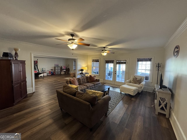 living room featuring dark wood-style floors, baseboards, ornamental molding, and french doors