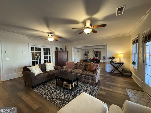 living room featuring french doors, wood finished floors, visible vents, and crown molding