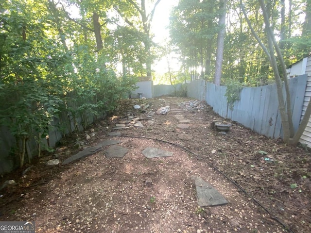 view of yard with a fenced backyard