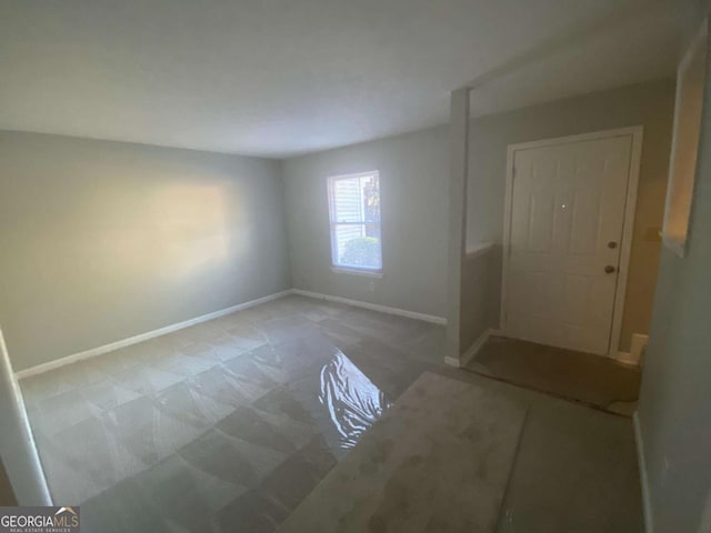 entrance foyer featuring baseboards