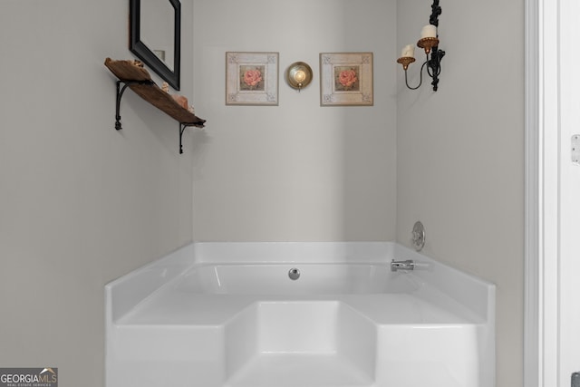 bathroom featuring a garden tub