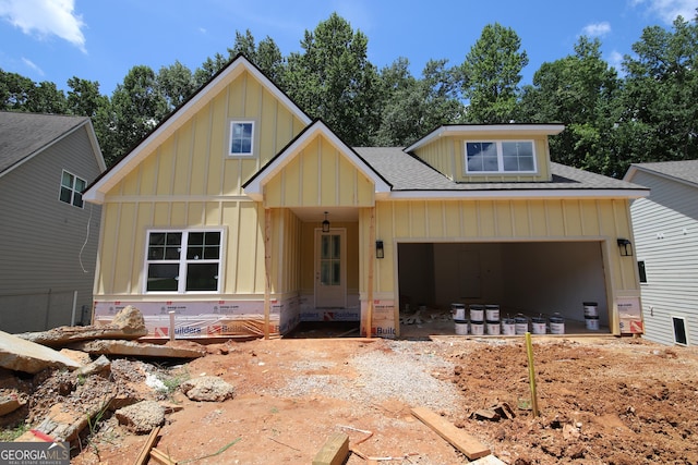 517 Tradition Pl, Lagrange, GA 30241 - view of front of home with board and batten siding, a shingled roof, and an attached garage