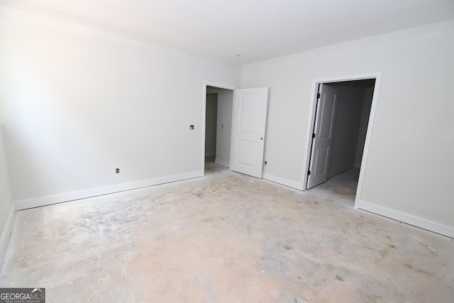 519 Tradition Pl, Lagrange, GA 30241 - unfurnished bedroom with concrete floors and baseboards