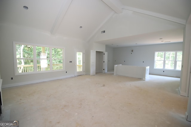 519 Tradition Pl, Lagrange, GA 30241 - unfurnished living room featuring beam ceiling and high vaulted ceiling