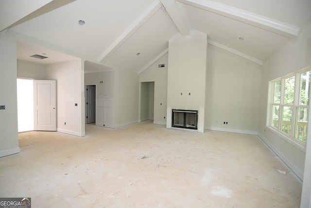 519 Tradition Pl, Lagrange, GA 30241 - unfurnished living room featuring beam ceiling, a fireplace, and high vaulted ceiling