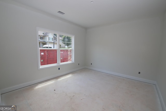 519 Tradition Pl, Lagrange, GA 30241 - empty room with unfinished concrete floors and baseboards