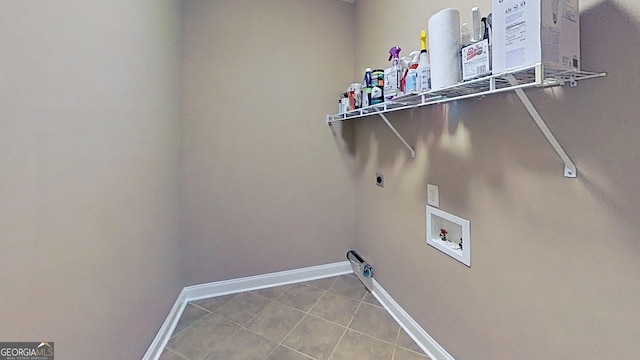 2026 Pin Oak Ter, Bonaire, GA 31005 - laundry room featuring washer hookup, hookup for an electric dryer, baseboards, and tile patterned floors