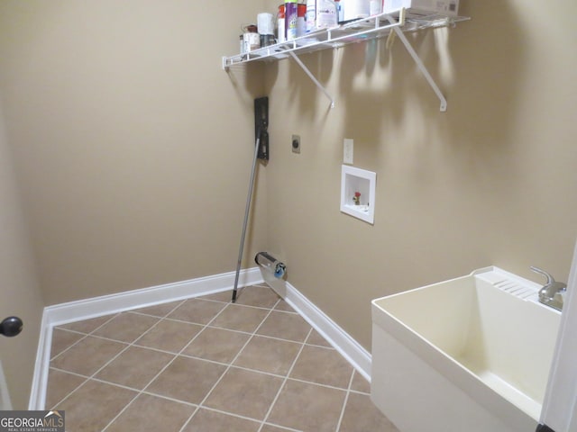 2026 Pin Oak Ter, Bonaire, GA 31005 - washroom with baseboards, washer hookup, hookup for an electric dryer, and tile patterned floors