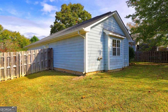 garage with fence