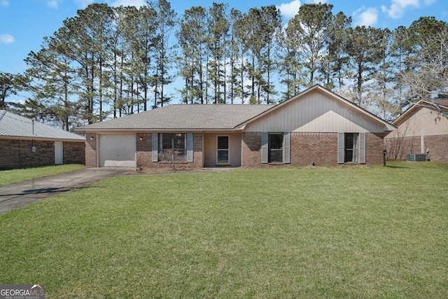 single story home featuring aphalt driveway, brick siding, a garage, cooling unit, and a front lawn