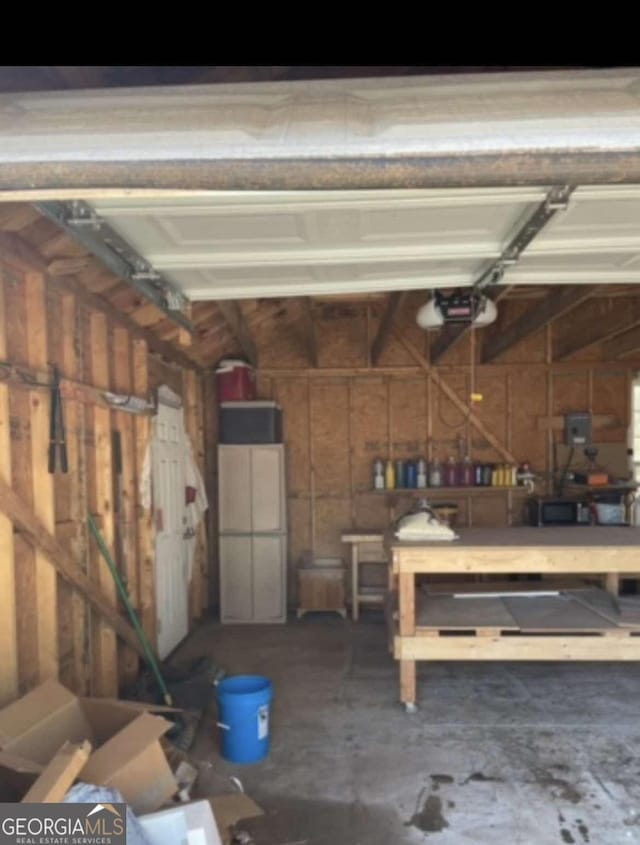 garage featuring a garage door opener