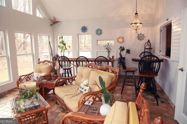 sunroom with lofted ceiling