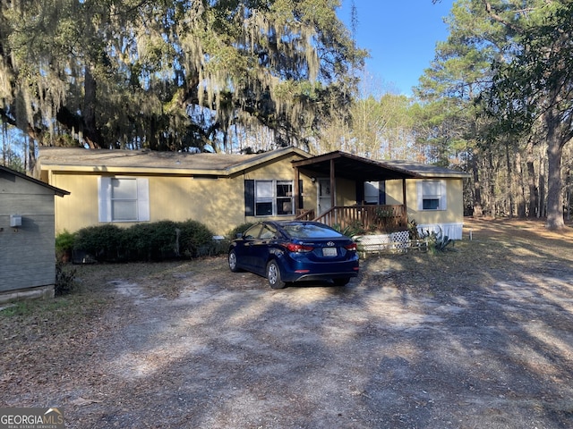 154 Buckhalter Rd, Savannah, GA 31405 - ranch-style house featuring a carport