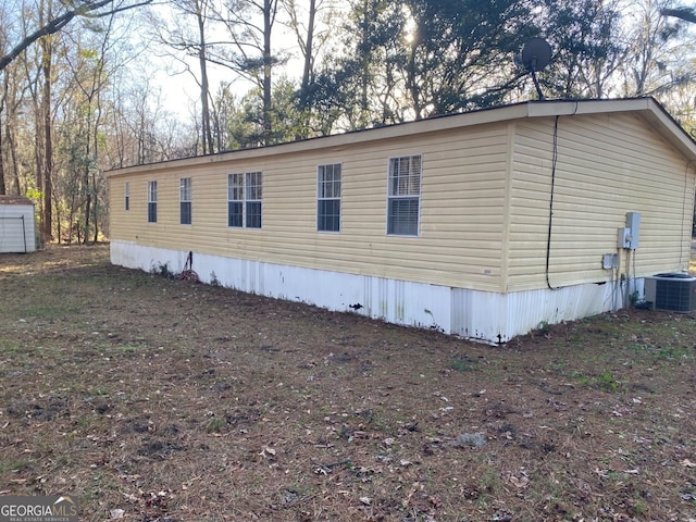 154 Buckhalter Rd, Savannah, GA 31405 - view of property exterior with central air condition unit