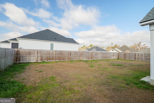 view of yard featuring a fenced backyard