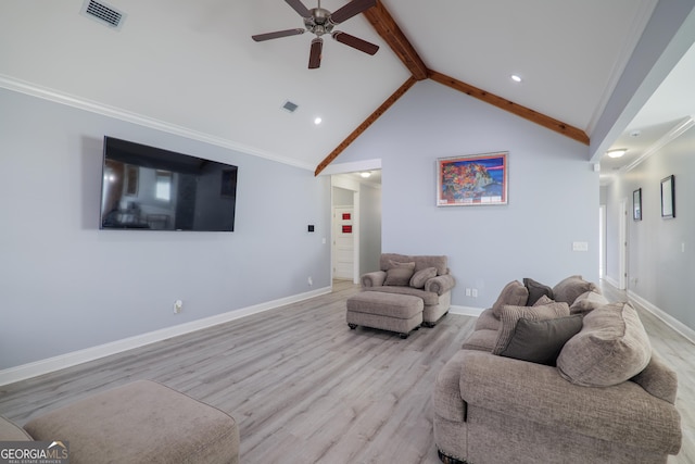 living area featuring baseboards, visible vents, beamed ceiling, and wood finished floors