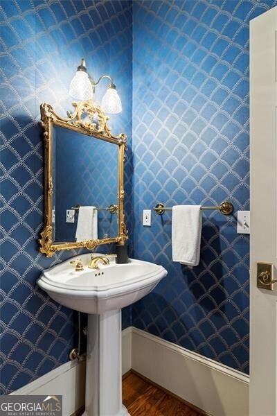 bathroom with wood finished floors