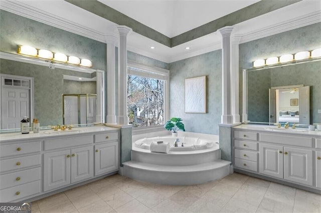 bathroom with wallpapered walls, a shower stall, and ornate columns