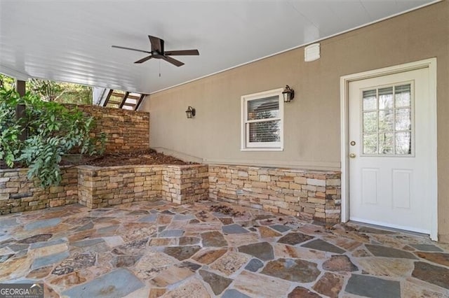 view of patio with a ceiling fan