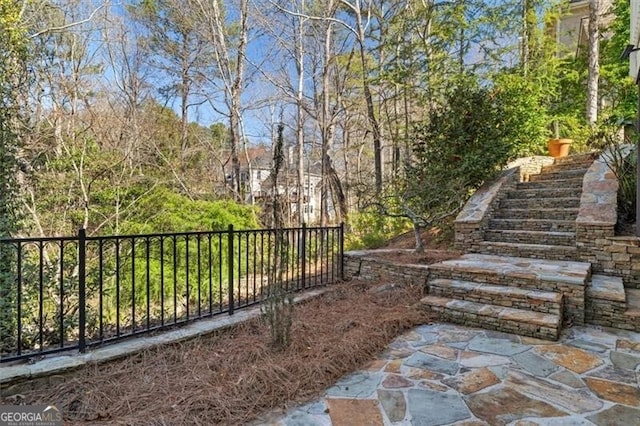 view of yard featuring stairway