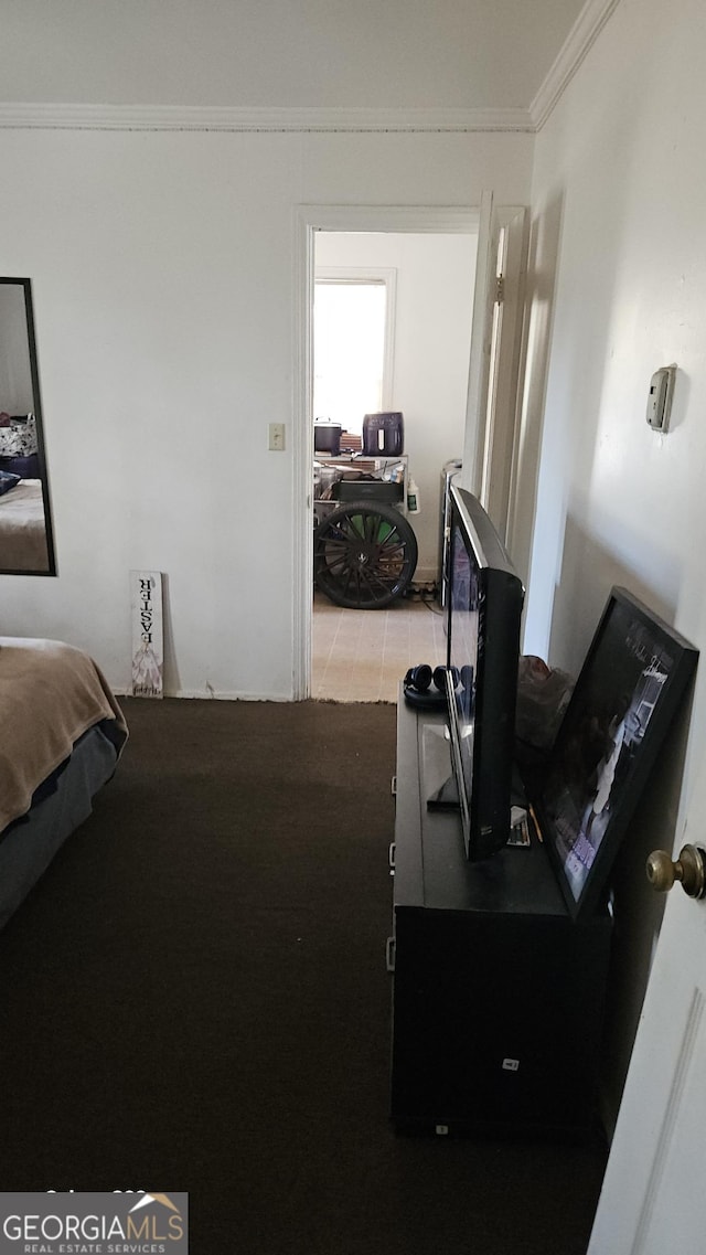 bedroom with ornamental molding