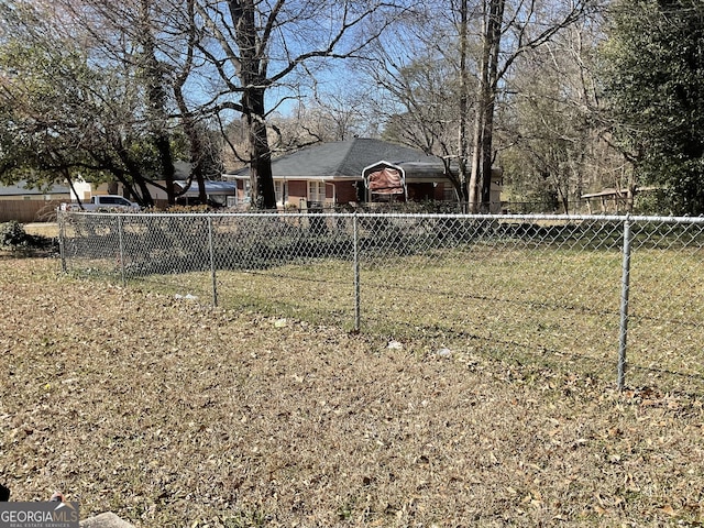 view of yard featuring fence