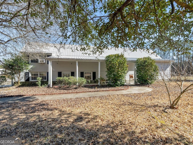 view of front of home with metal roof