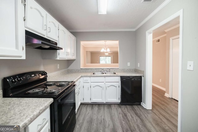 2505 Broad St W Unit 713, Athens, GA 30606 - kitchen featuring black appliances, under cabinet range hood, light wood finished floors, white cabinets, and crown molding