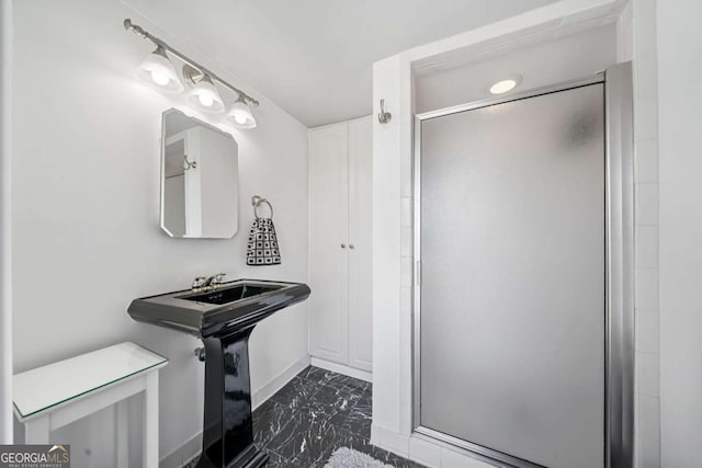 full bathroom featuring a stall shower and marble finish floor